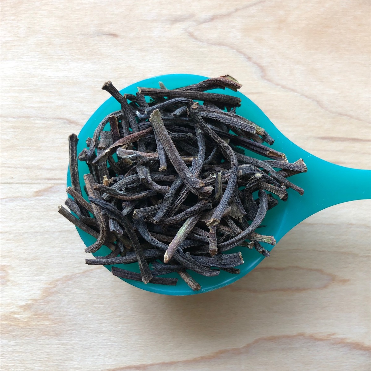 Spoonful of white tea steams